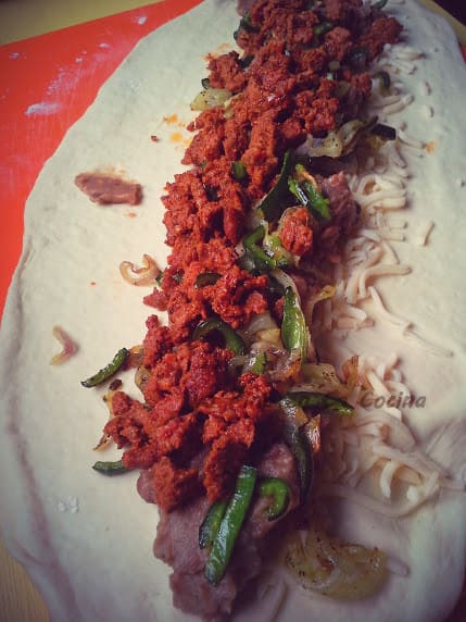 From scratch, refried beans, Mexican chorizo, Chihuahua cheese, sauteed poblanos and shallots