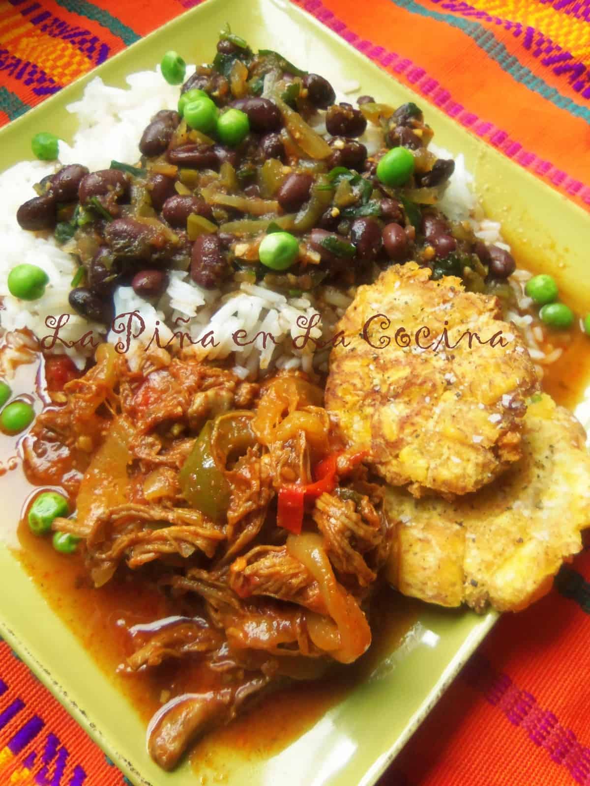Ropa Vieja, the second day. Served with Cuban style black beans, steamed white rice and tostones