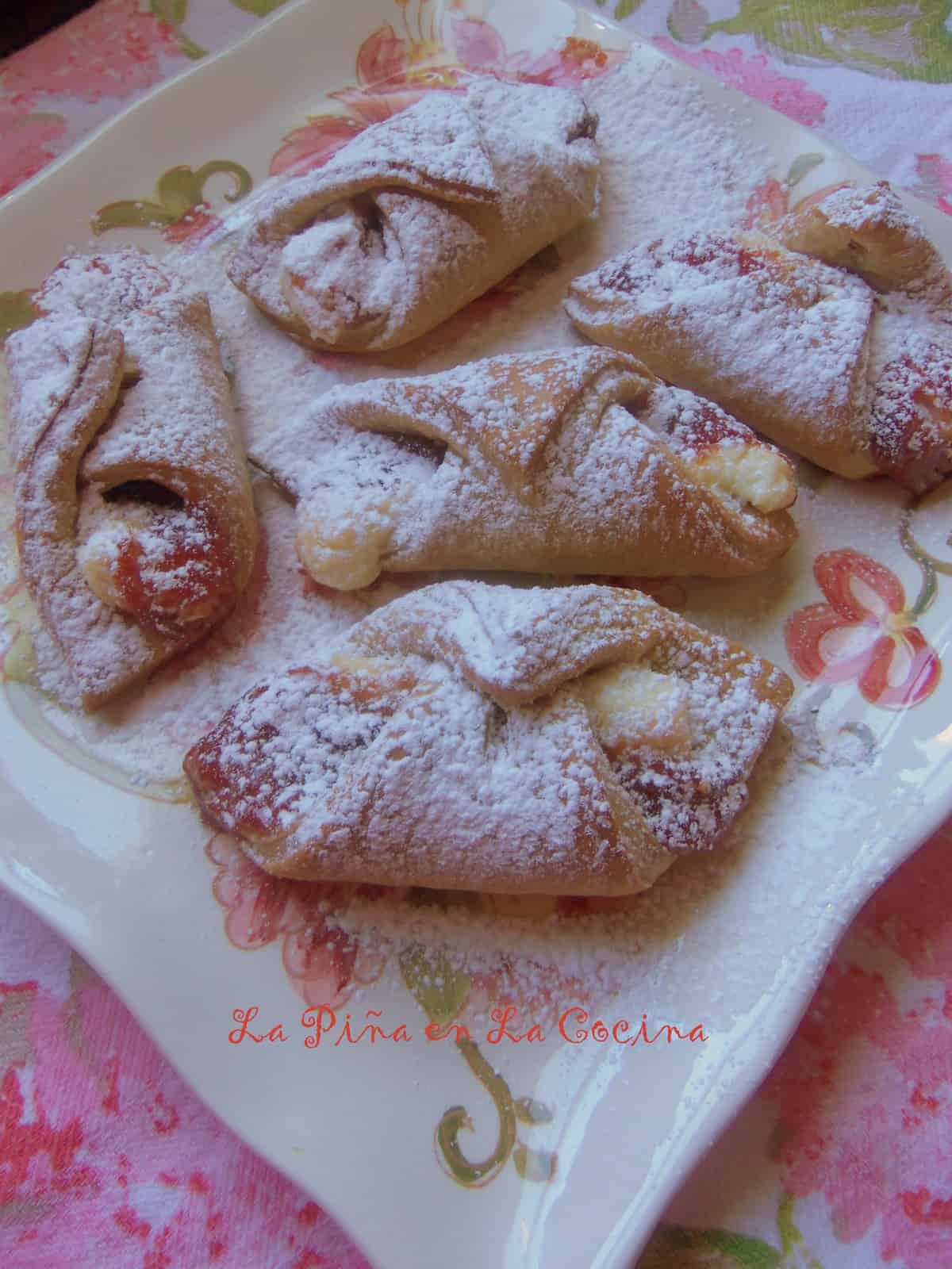 Quesitos filled with guava and sweetened cream cheese. Often prepared with puff pastry, but I had a little bit of a sweet yeast dough leftover from a previous recipe that worked well. This recipe was adapted from TheNoshery.com