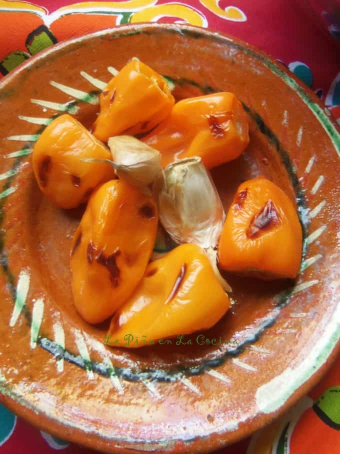 Roasted Habanero with roasted Garlic  for Salsa on a plate