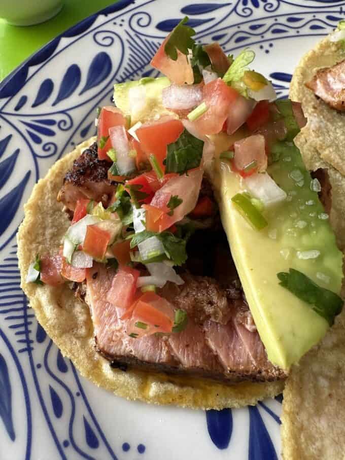 taco up close with fresh salsa and avocado