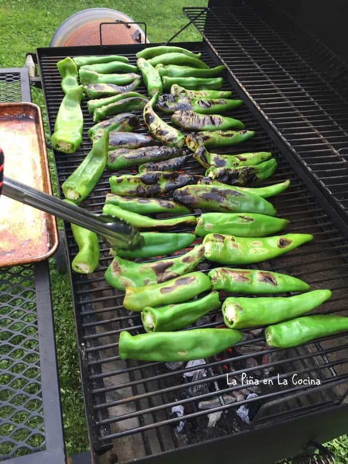 fire roasting green chiles on outdoor grill