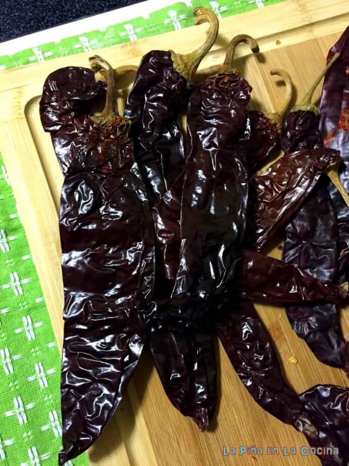 Dried chiles on cutting board