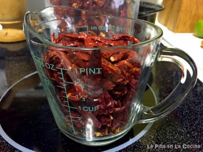 dried chiles in measuring cup
