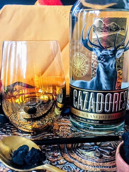 Cazadores Tequila Añejo Cristalino Bottle with Glass of Cristalino