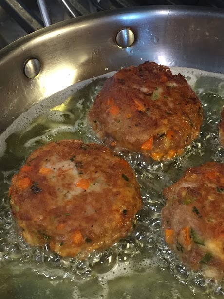 Nicely Browned Tuna Cakes Frying in Grapeseed oil