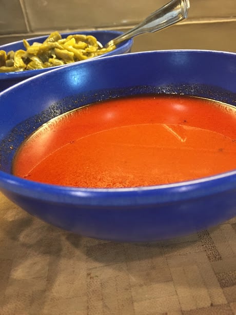 Tortitas de Camaron Seco. Dried Shrimp Cakes. Red chile sauce in a bowl.