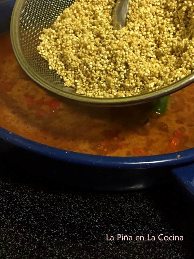 Mexican-Style Quinoa Adding Quinoa To Simmering Broth