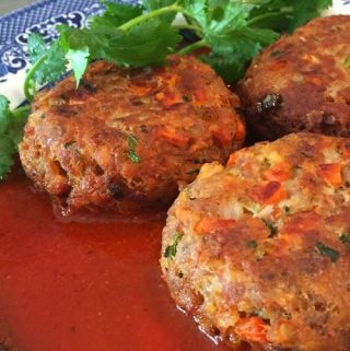 Tuna Cakes Plated With Red Chile Sauce