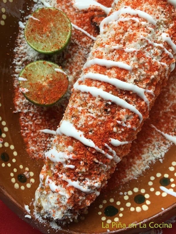 Grilled Mexican Elote Garnished with the Works