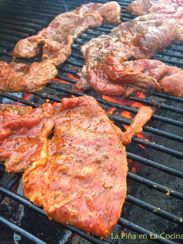 Adobo marinated steak on the grill