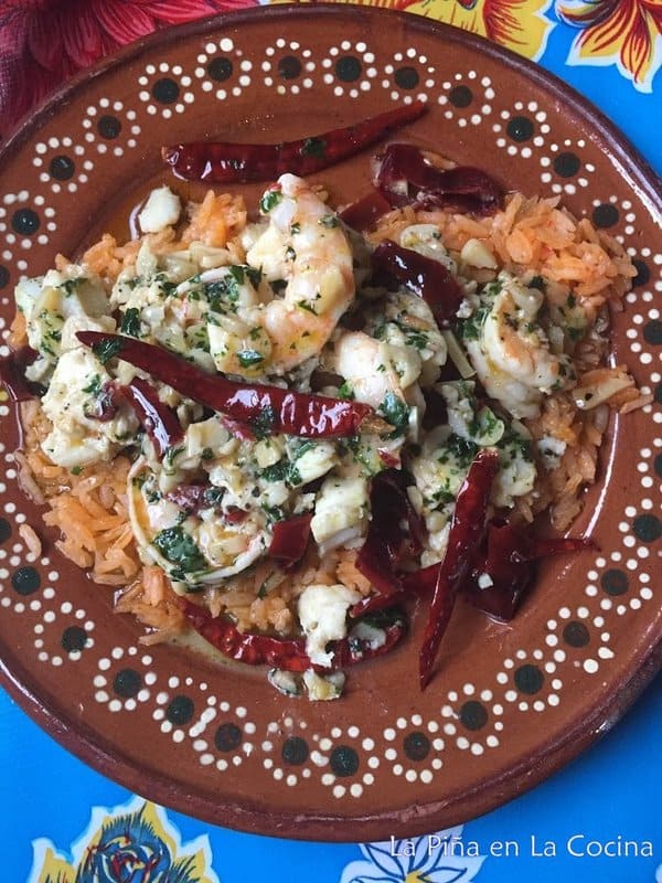 mexican garlic shrimp plated with rice top view