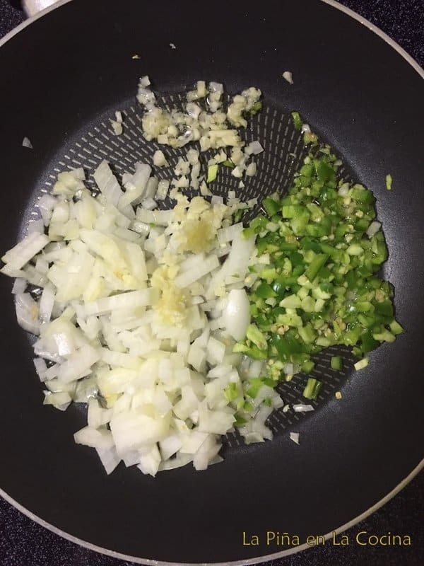 Onion, garlic and jalapeño in saute pan
