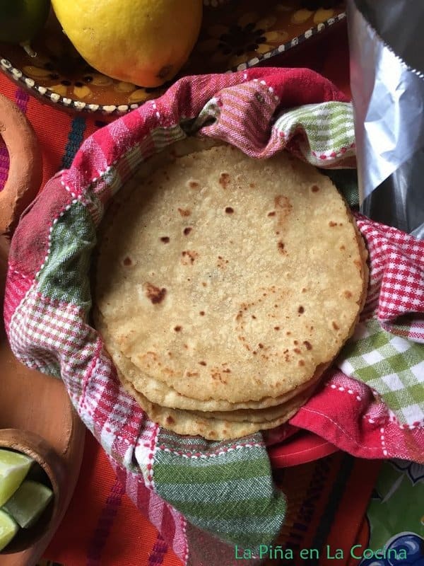 Tortillas in warmer with cover off,