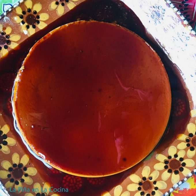 Close up top view of flan on Mexican platter