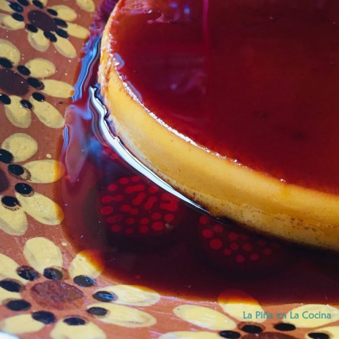 Close up of one side of flan on Mexican platter
