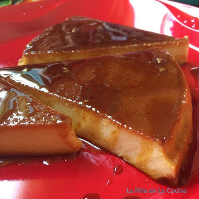 Sliced flan on a red plate