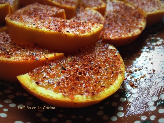 Half moon sliced oranges with chile limon powder