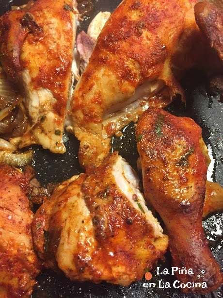 Oven roasted chicken with adobo, sliced into pieces