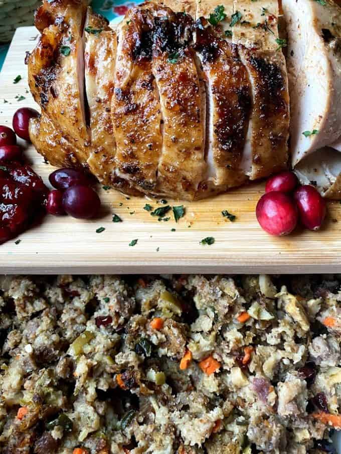 Sliced turkey breast on the cutting board with stuffing