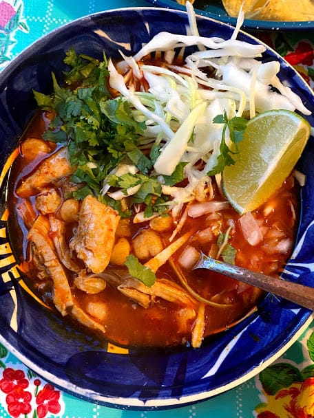 Top view of bowl of chicken pozole
