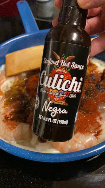 Bottle of Mexican hot sauce prepared with chiltepin