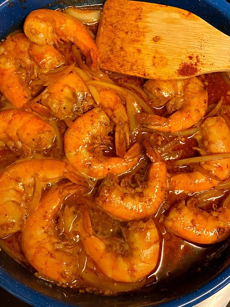 spicy shrimp in a butter and lime sauce in saute pan