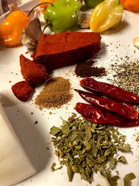 Ingredients, spices and chiles used in pork pibil adobo