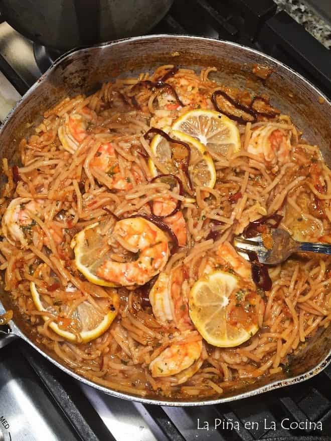 top view of finished fideo with shrimp in skillet