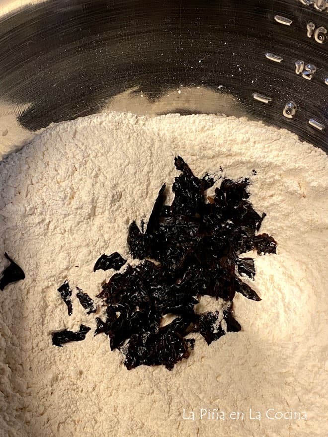 A variation is to add torn pieces of dried chile ancho into flour for bread recipe