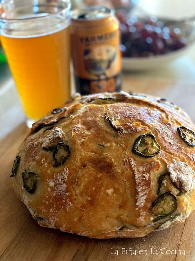 Jalapeño loaf with glass of beer in the back round 