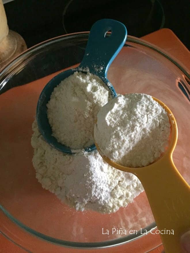 bowl filled with flour, masa harina and baking powder