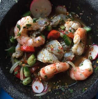 Top view of shrimp ceviche in molcajete
