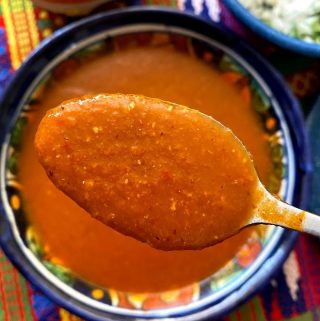 close up of salsa on a spoon