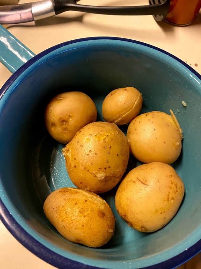 Cooked white potatoes after water was drained out