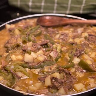 skillet of beef and potato with green chile