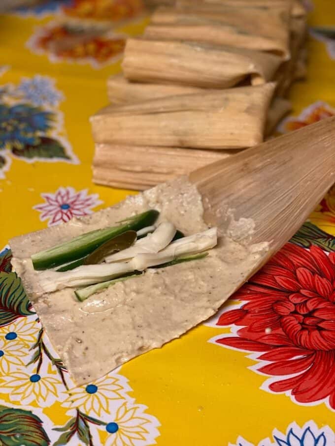 close up of tamal filling on table