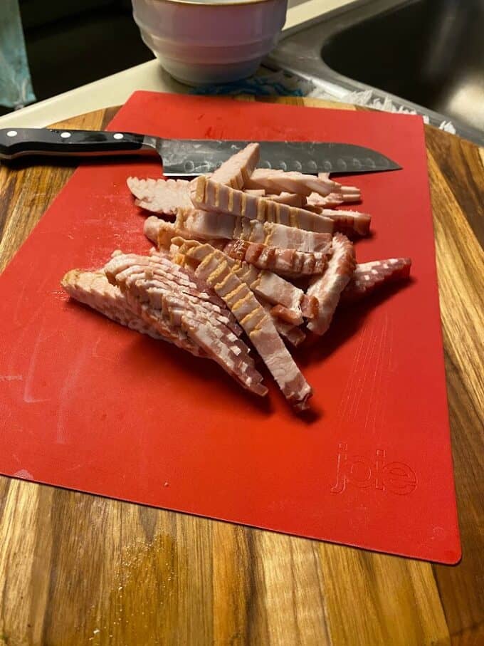 sliced bacon on cutting board