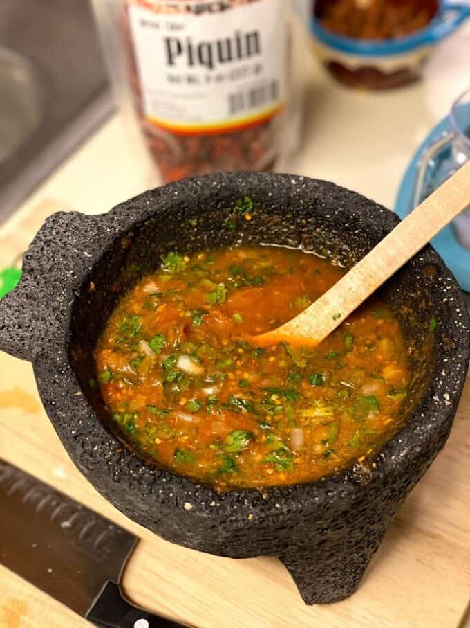 video version of chile piquin salsa in the molcajete