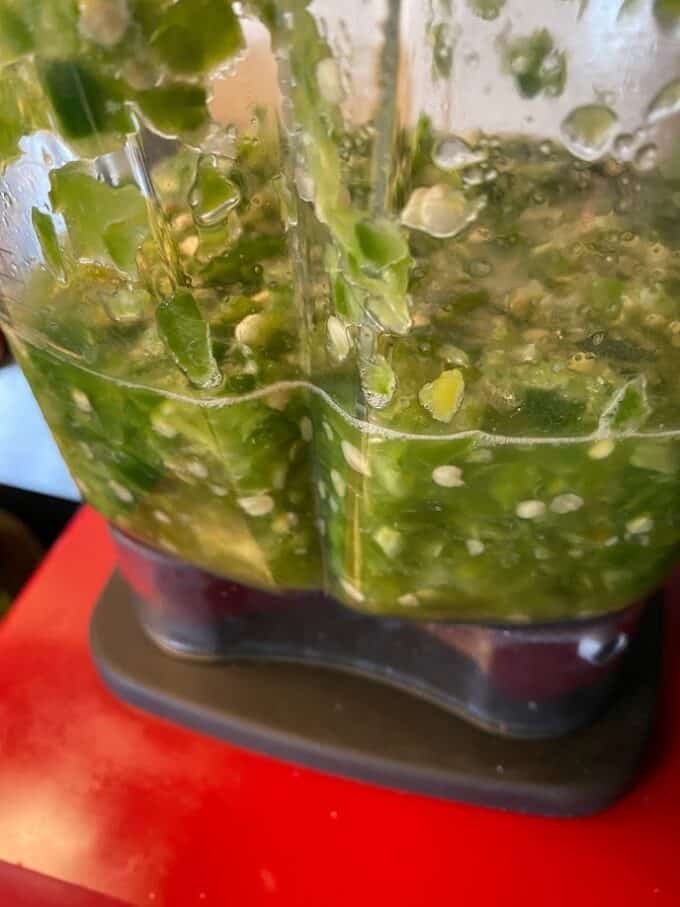 Freshly blended salsa close up in blender jar