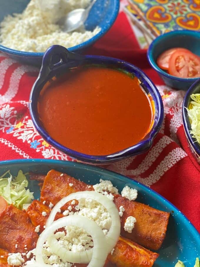 enchiladas and sauce close up