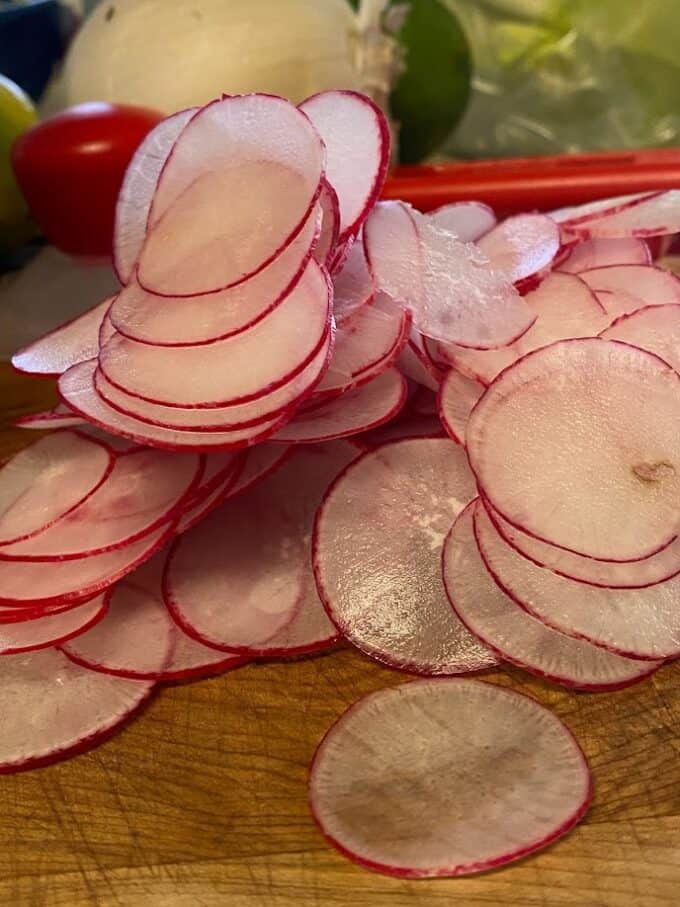 thin sliced radishes
