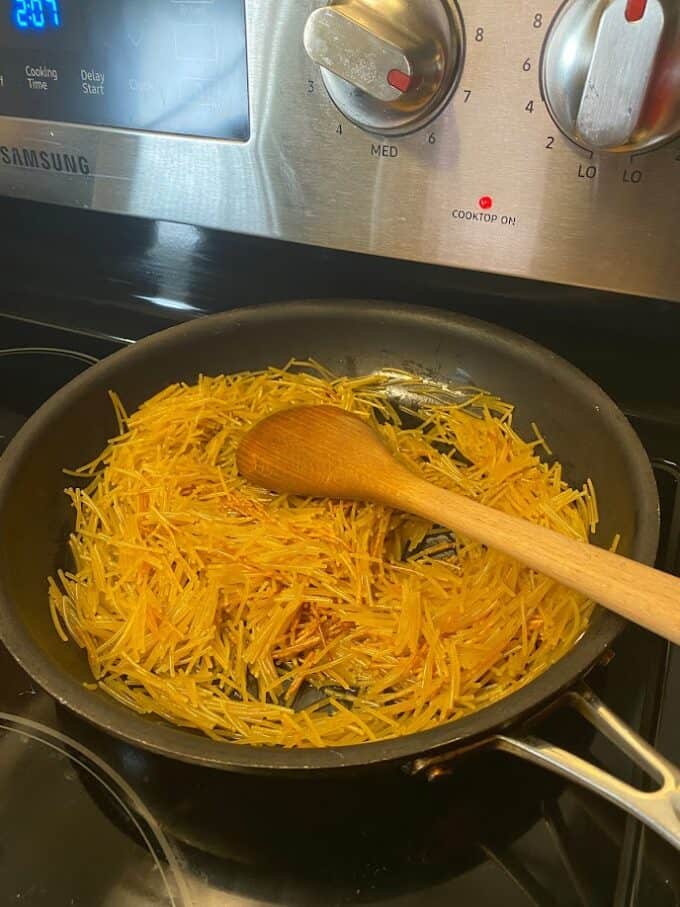 frying fideo pasta in skillet
