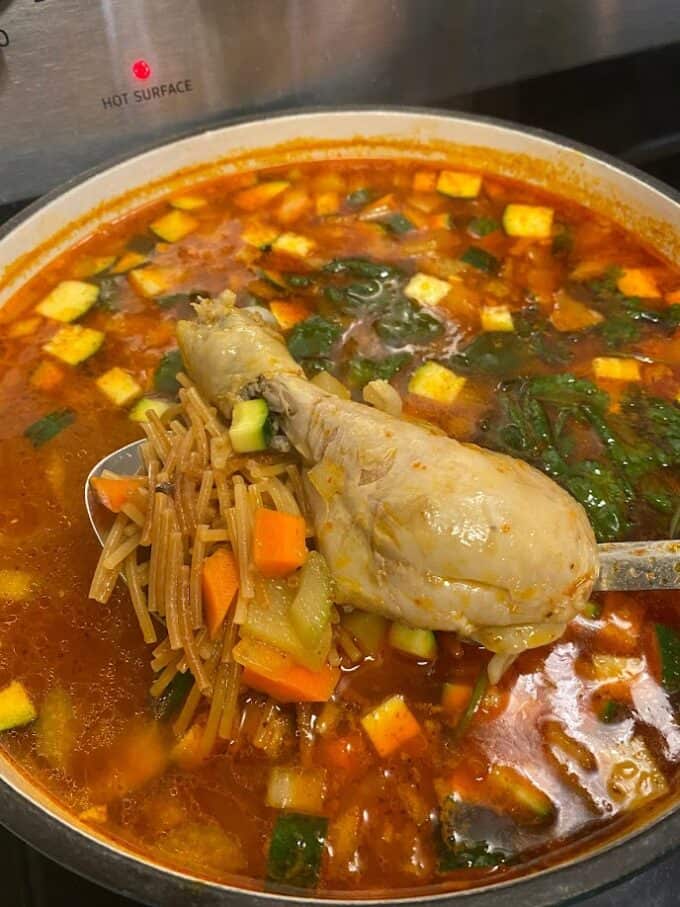 sopa in large pot with chicken