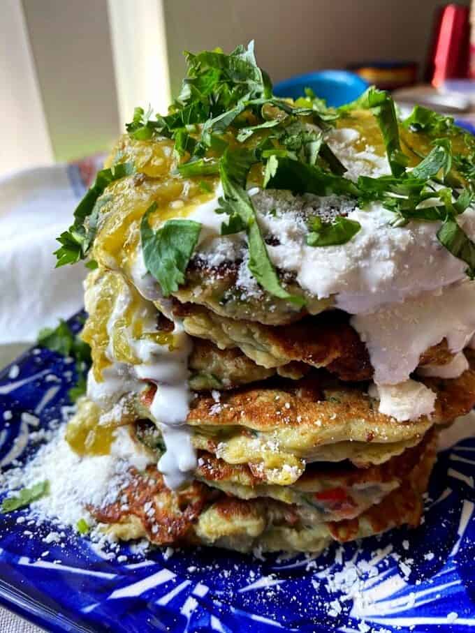 stacked fritters with garnishes