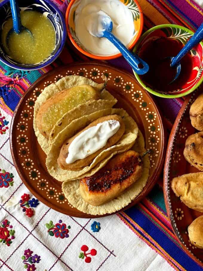 plate rellenos with salsa garnish, tacos