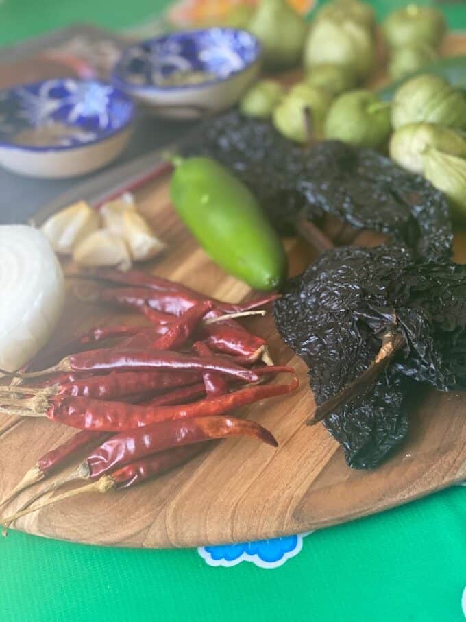dried chiles and fresh ingredients for salsa