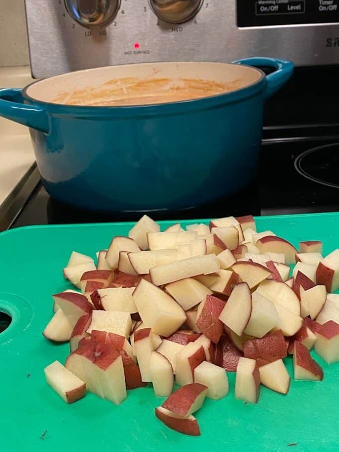 diced red potatoes on cutting board