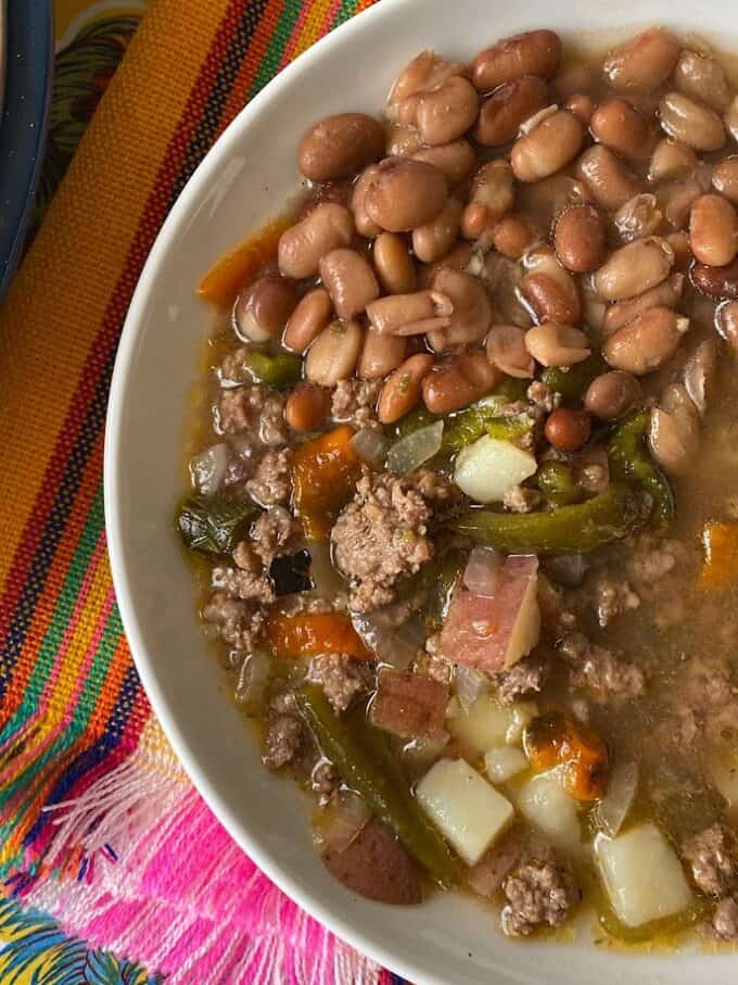close up of picadillo and whole pinto beans