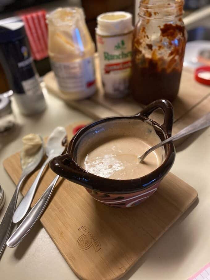 Crema in small bowl with spoon